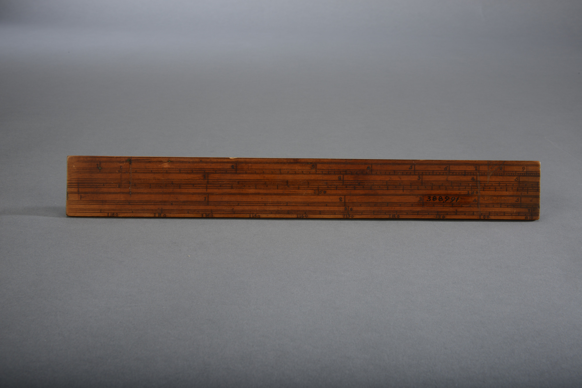 Figure 3 — Gunter's scale, a logarithmic line laid out along a ruler.