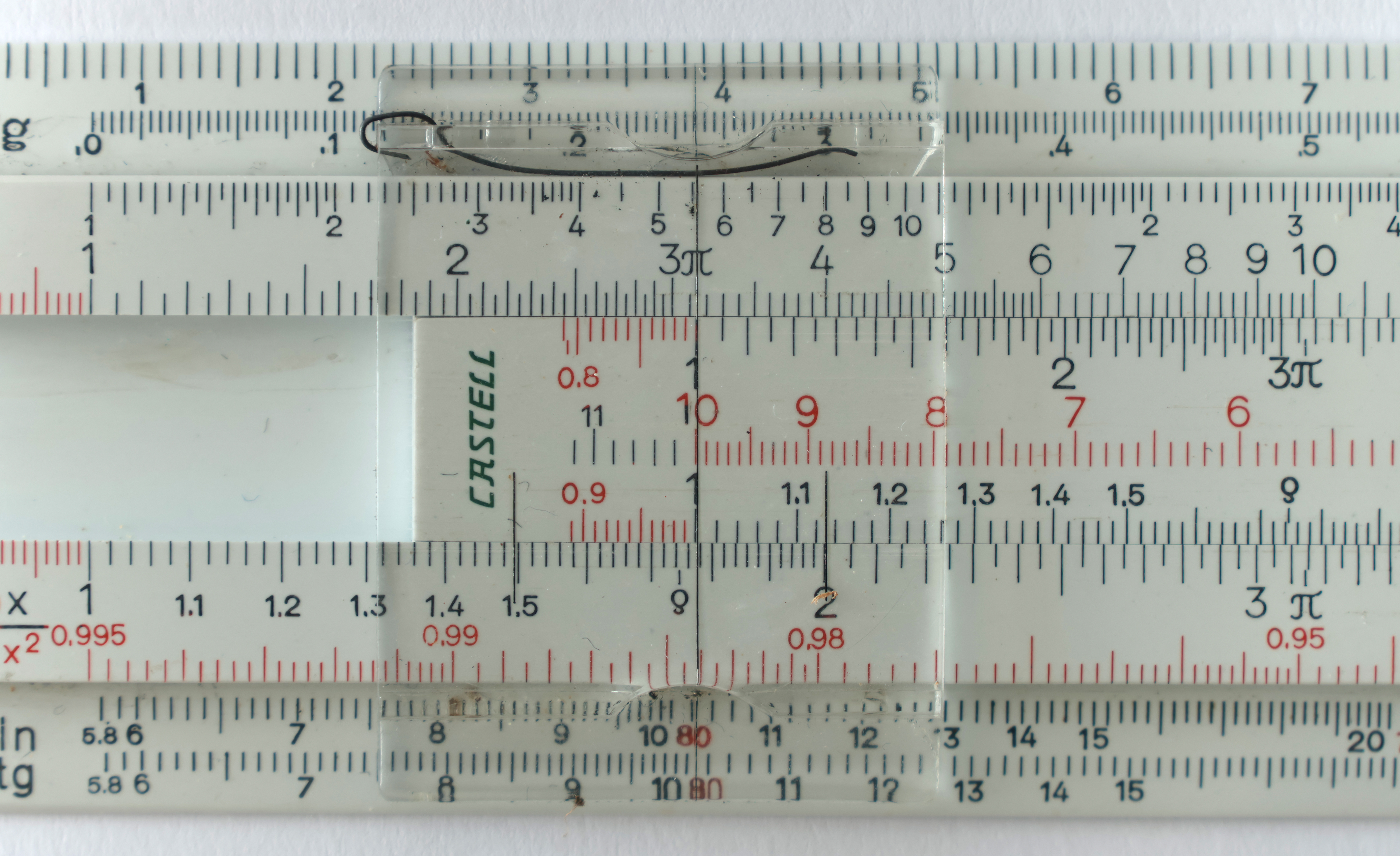 Figure 3 — Close-up of the C and D scales under the cursor on a Faber-Castell Darmstadt rule, the graduations clearly legible.